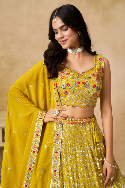 Wonderful Yellow Georgette Lehenga Choli with Floral Zari Embroidery and Matching Dupatta for Wedding