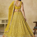 Wonderful Yellow Georgette Lehenga Choli with Floral Zari Embroidery and Matching Dupatta for Wedding