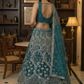 Superb Teal Green Net Embroidered Bridal Lehenga Choli with Matching Dupatta for Wedding