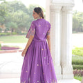 Unique Purple Vichitra Silk Embroidered Gown with Printed Border and Koti