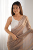 Beige Georgette Saree with Scalloped Border Party Wear Saree