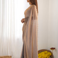 Beige Georgette Saree with Scalloped Border Party Wear Saree