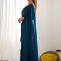 Teal Blue Georgette Saree with Pink Scalloped Border Party Wear Saree