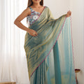 Sea Green Georgette Saree with Pink Scalloped Border Party Wear Saree