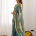 Sea Green Georgette Saree with Pink Scalloped Border Party Wear Saree
