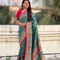 Teal Green Printed Silk Saree with Multicolor Traditional Border
