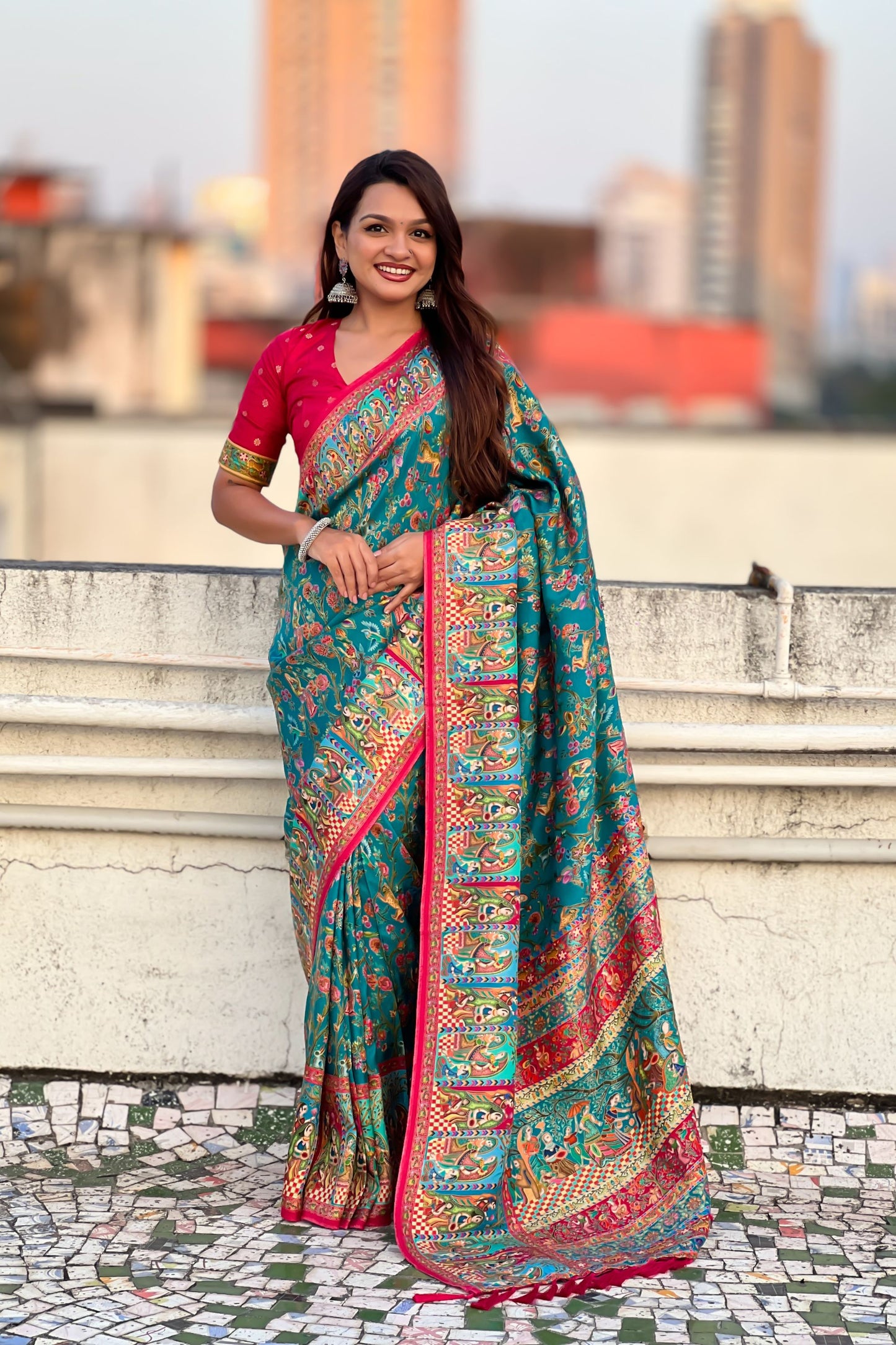Teal Green Printed Silk Saree with Multicolor Traditional Border