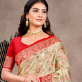 Cream Red Banarasi Silk Saree with Floral Weaving and Rich Zari Pallu