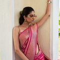 Rani Pink Silk Traditional Saree with Gold Zari Stripes Rich Woven Border