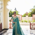 Elegant Teal Green Silk Saree with Gold Zari Stripes Rich Woven Border