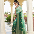 Dark Green Banarasi Silk Saree with Gold Zari Butta Work and Rich Woven Border