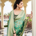 Dark Green Banarasi Silk Saree with Gold Zari Butta Work and Rich Woven Border