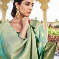 Dark Green Banarasi Silk Saree with Gold Zari Butta Work and Rich Woven Border