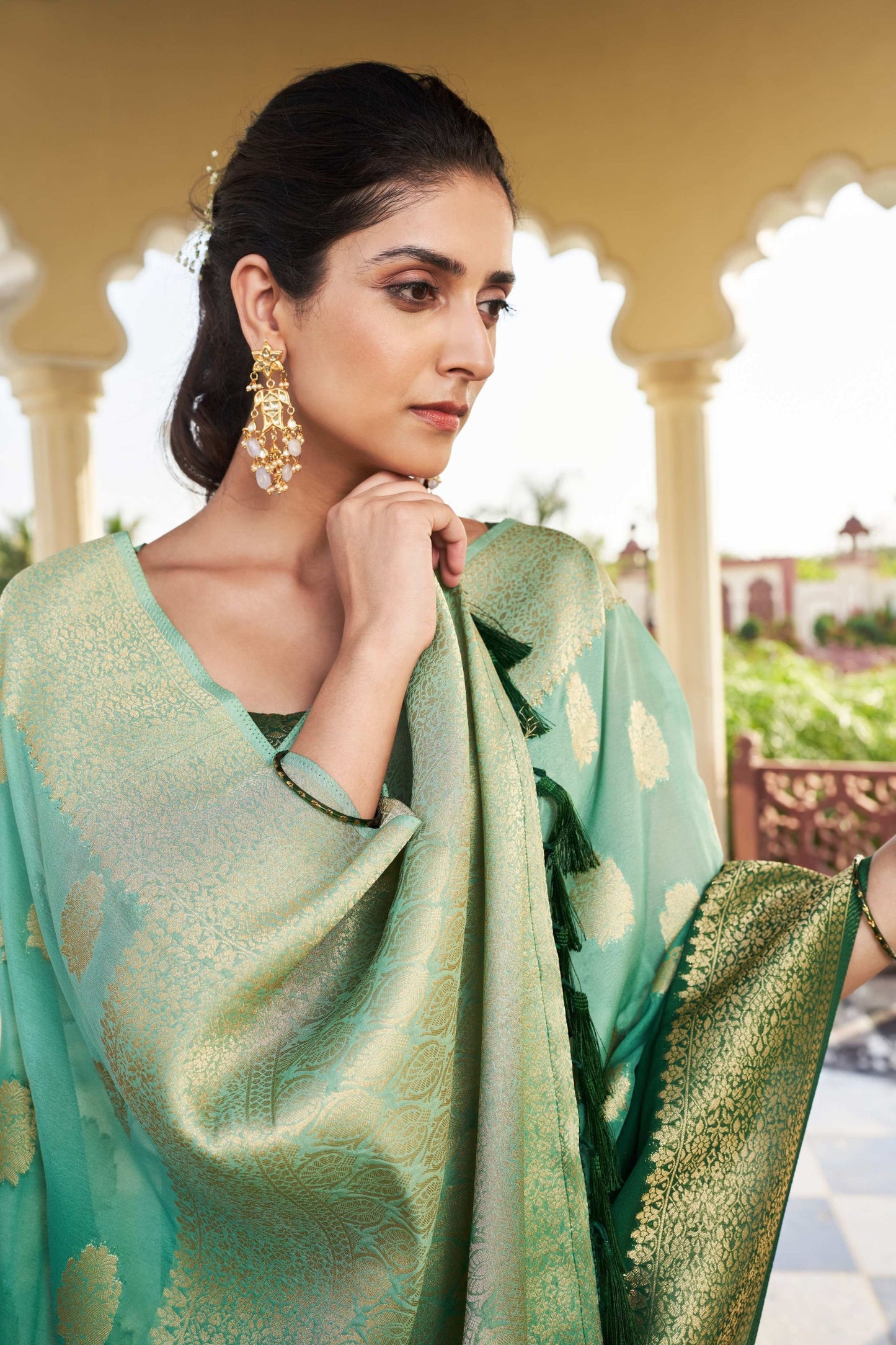 Dark Green Banarasi Silk Saree with Gold Zari Butta Work and Rich Woven Border