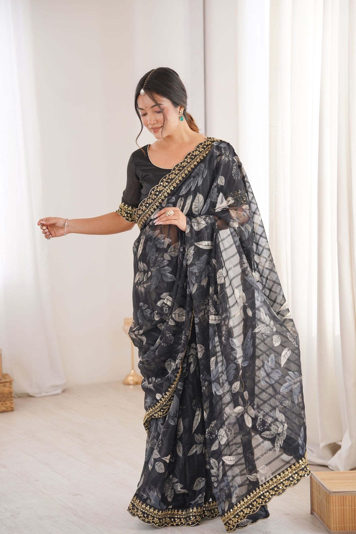 Black Georgette Saree with Golden Embroidered Border Leaf Print