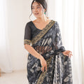 Black Georgette Saree with Golden Embroidered Border Leaf Print