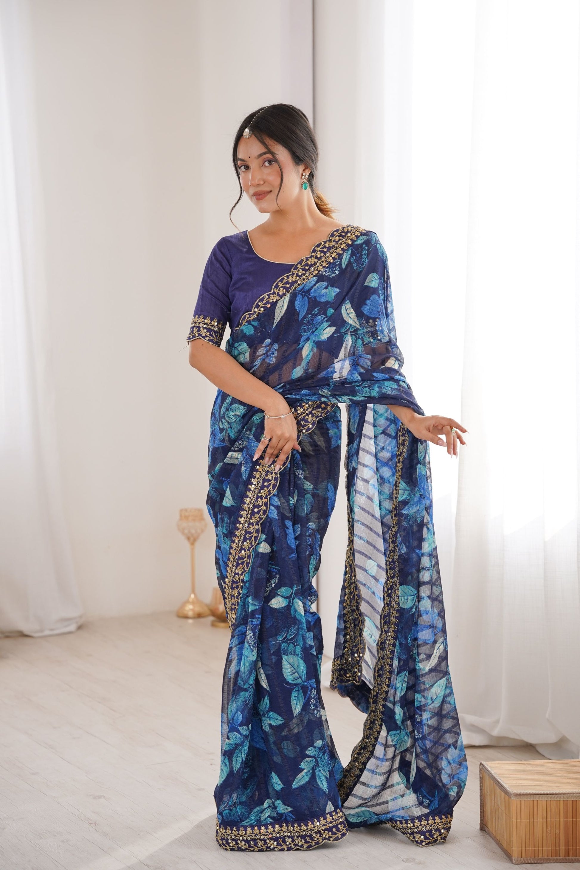 Navy Blue Georgette Leaf Print Saree with Golden Embroidered Border