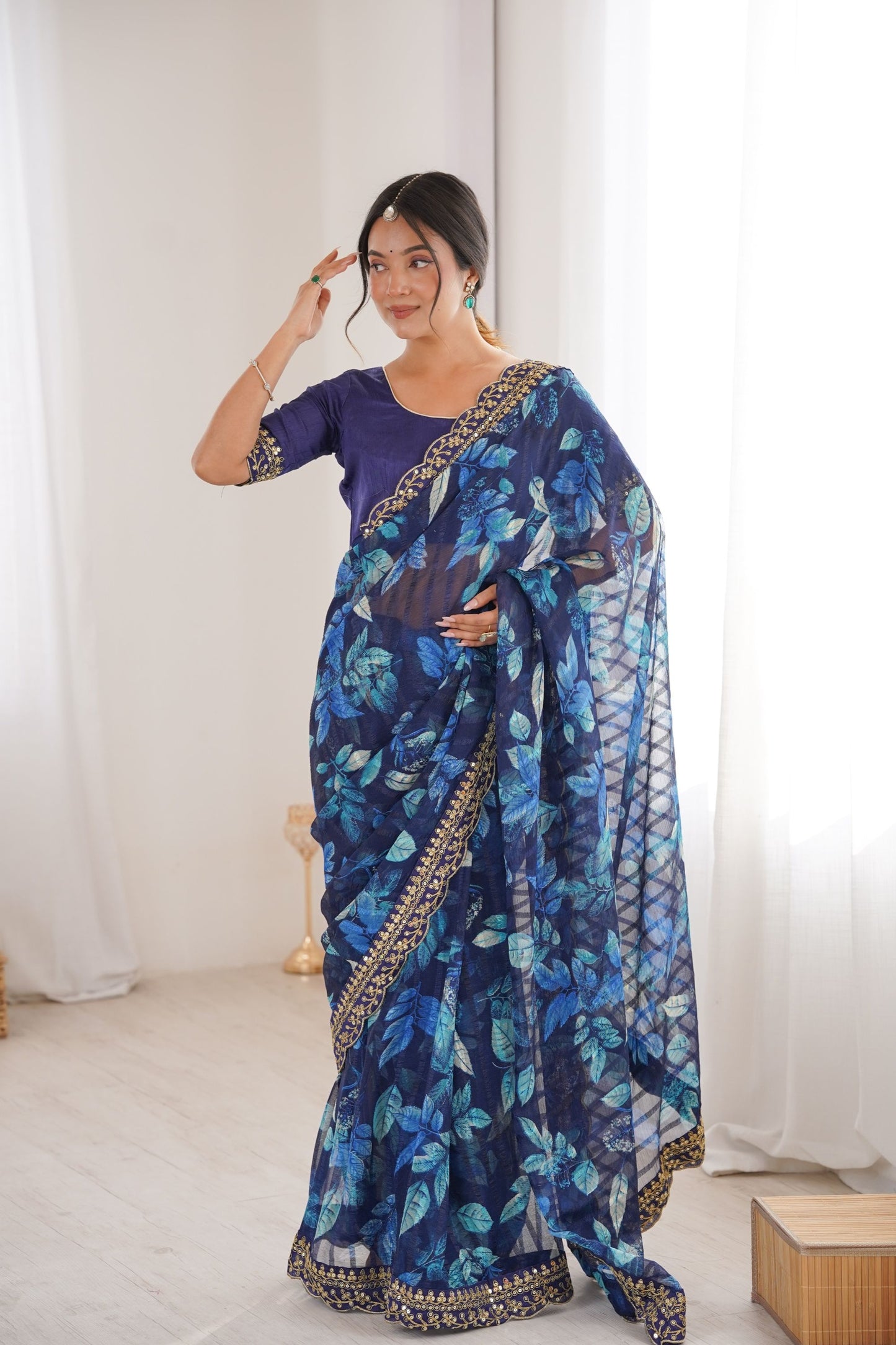 Navy Blue Georgette Leaf Print Saree with Golden Embroidered Border