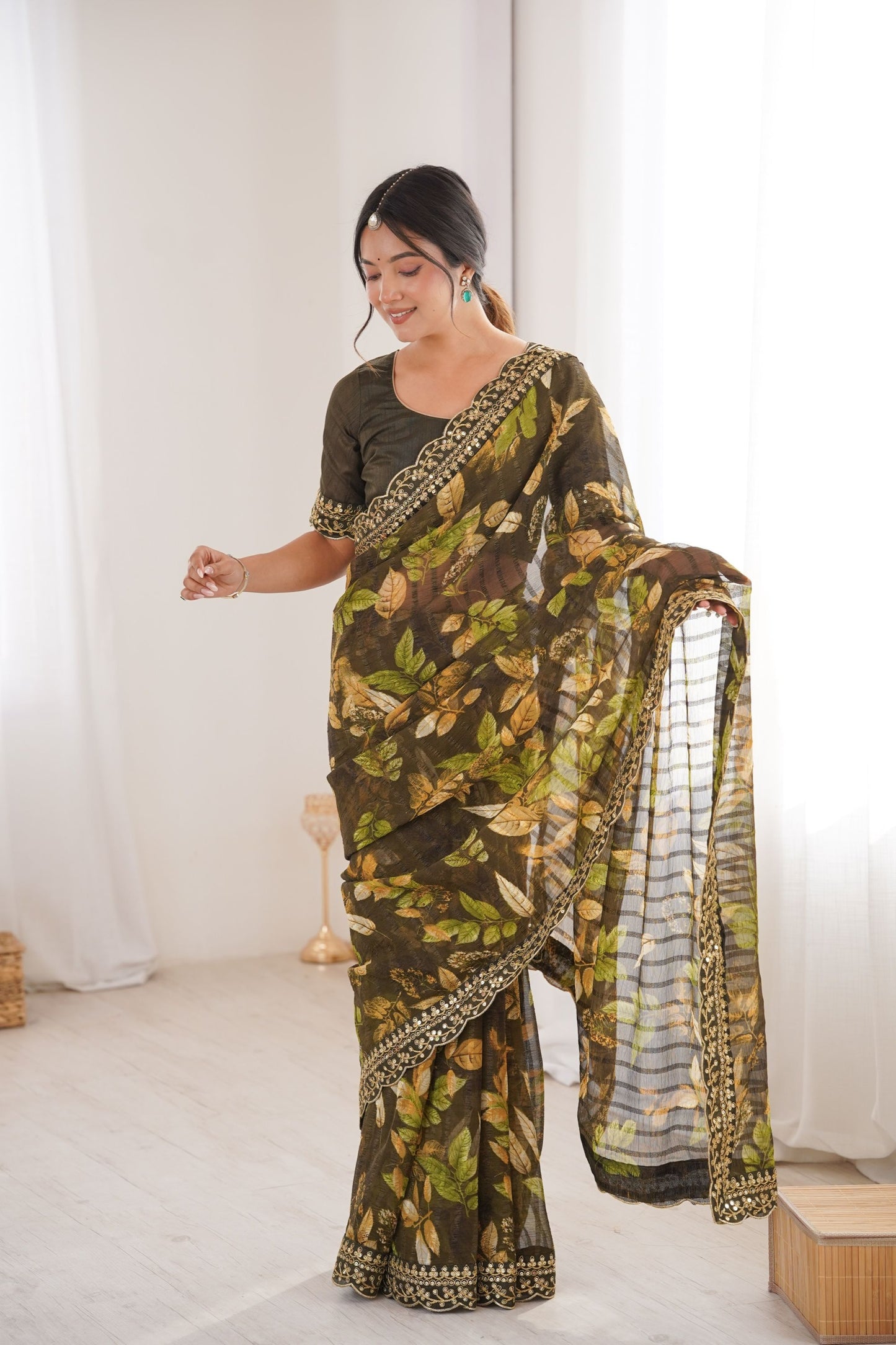 Olive Green Georgette Leaf Print Saree with Golden Embroidered Border