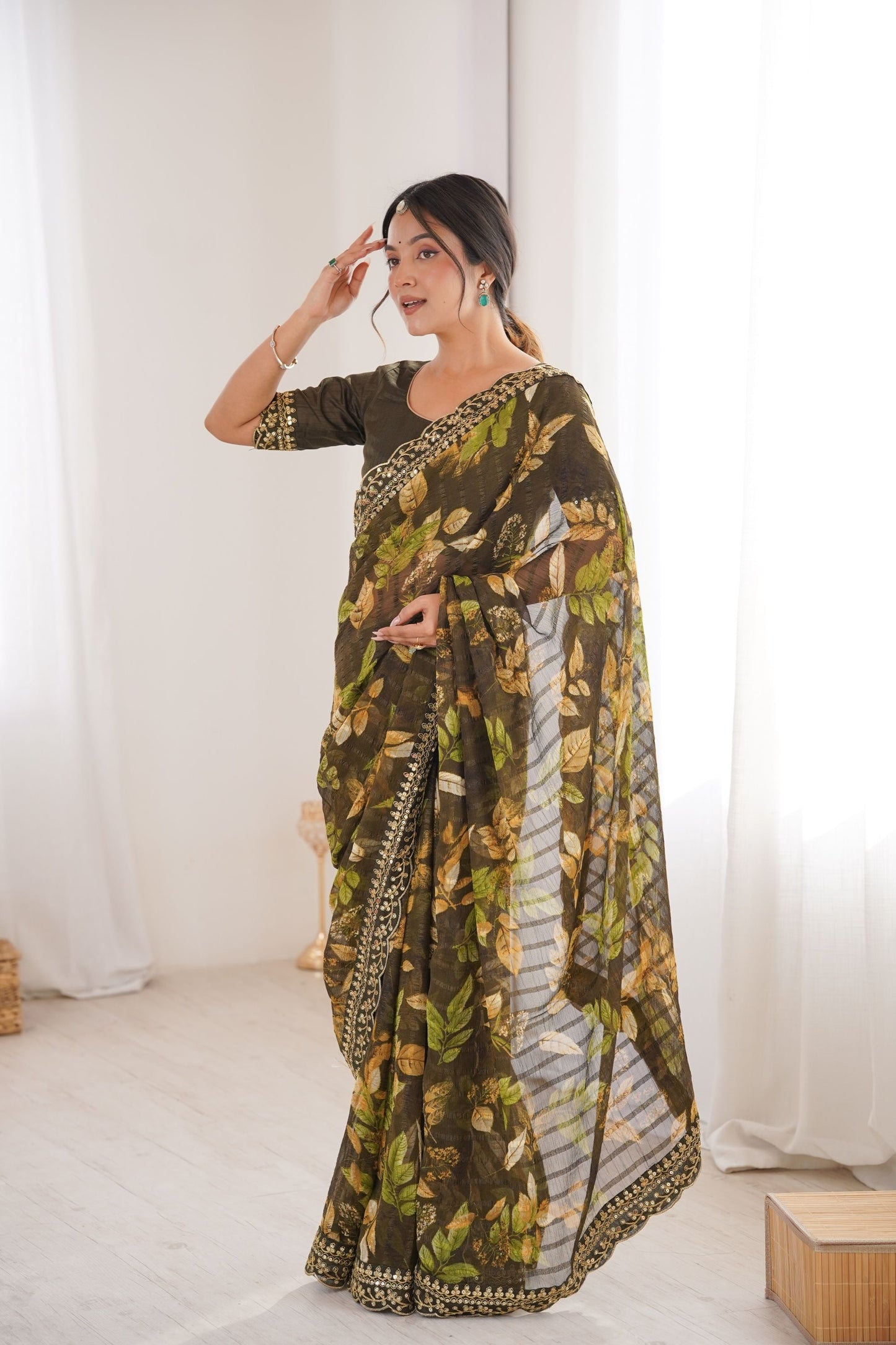 Olive Green Georgette Leaf Print Saree with Golden Embroidered Border