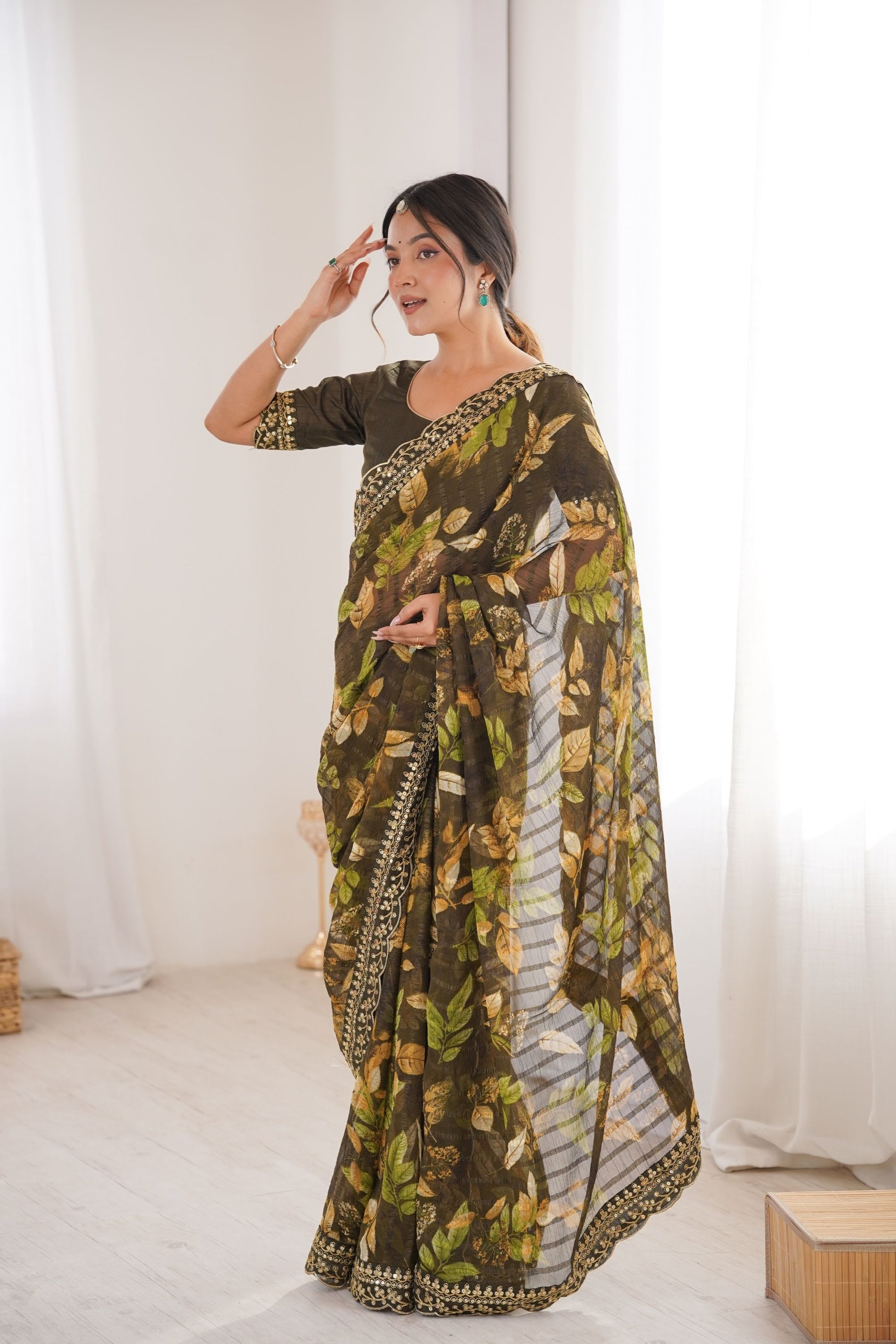 Olive Green Georgette Leaf Print Saree with Golden Embroidered Border