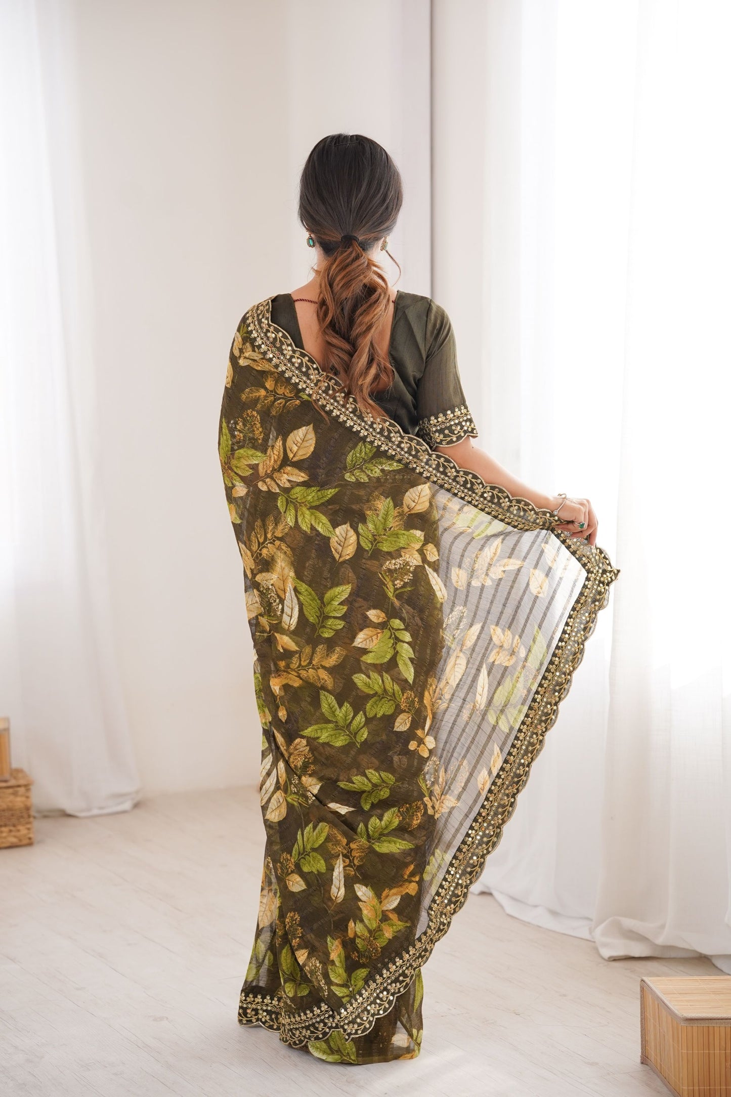 Olive Green Georgette Leaf Print Saree with Golden Embroidered Border