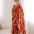 Rust Orange Georgette Leaf Print Saree with Golden Embroidered Border