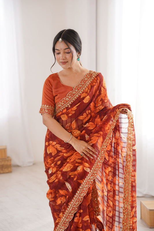 Rust Orange Georgette Leaf Print Saree with Golden Embroidered Border