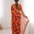 Rust Orange Georgette Leaf Print Saree with Golden Embroidered Border