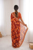 Rust Orange Georgette Leaf Print Saree with Golden Embroidered Border
