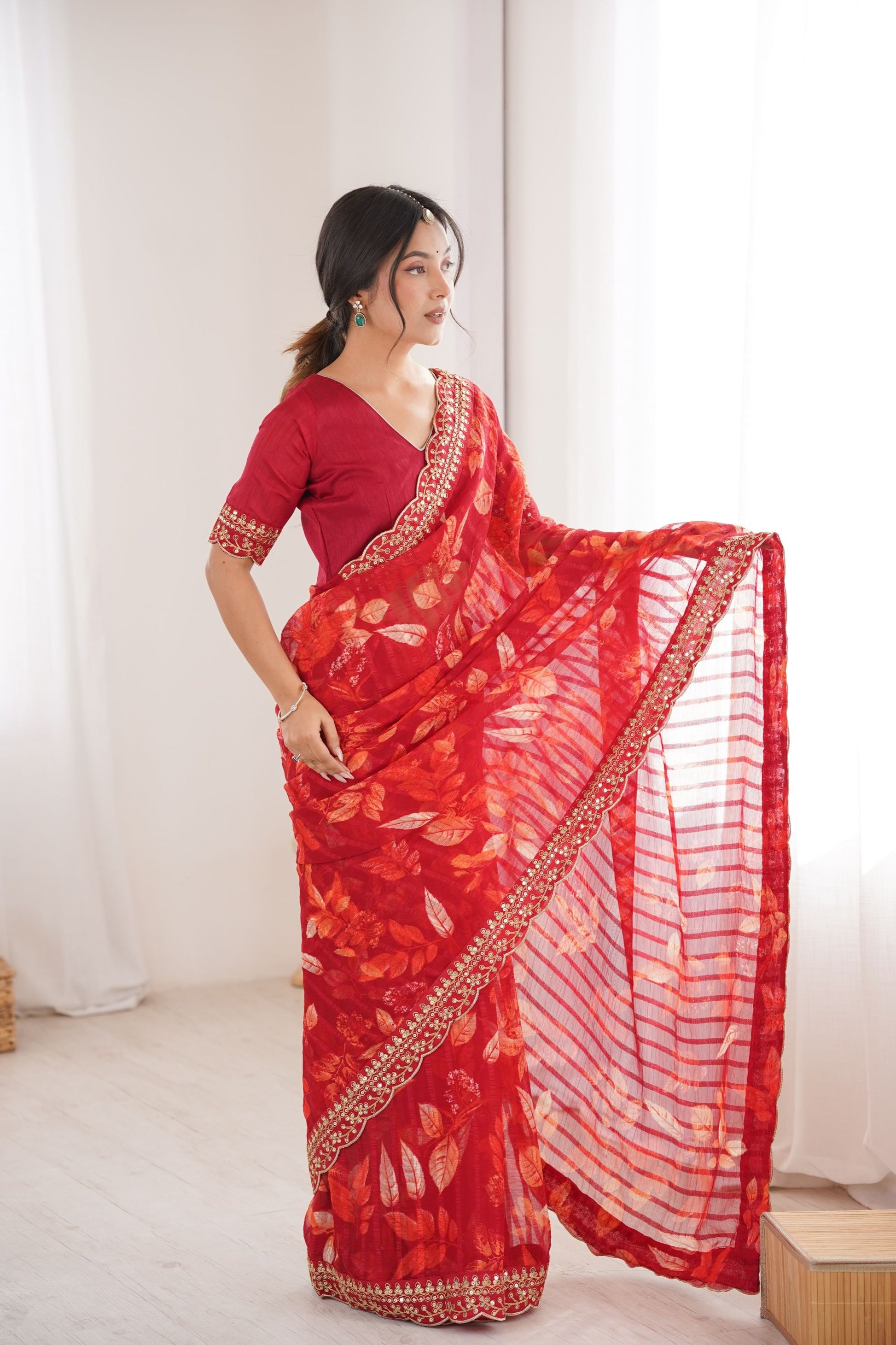 Red Georgette Leaf Print Saree with Golden Embroidered Border 