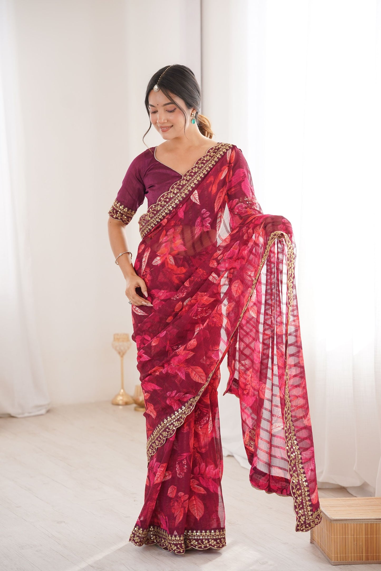 Wine Maroon Georgette Leaf Print Saree with Golden Embroidered Border