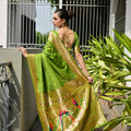 Parrot Green Silk Saree Woven Butta Contrast Golden Peacock Pallu