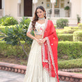 Graceful Off-White Embroidered Cosmos Silk Lehenga Choli with Red Dupatta for Wedding