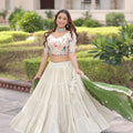 Fabulous Off-White Embroidered Cosmos Silk Lehenga Choli with Green Dupatta for Wedding