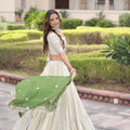 Fabulous Off-White Embroidered Cosmos Silk Lehenga Choli with Green Dupatta for Wedding