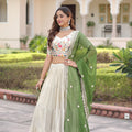 Fabulous Off-White Embroidered Cosmos Silk Lehenga Choli with Green Dupatta for Wedding