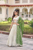 Fabulous Off-White Embroidered Cosmos Silk Lehenga Choli with Green Dupatta for Wedding