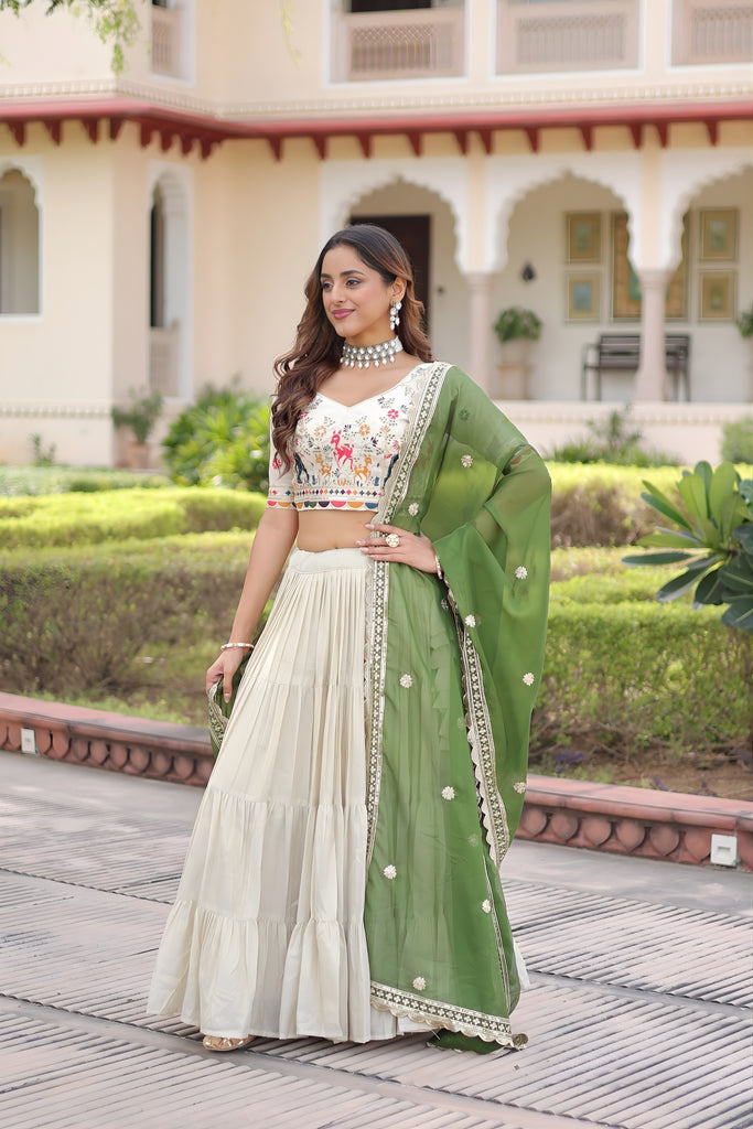 Fabulous Off-White Embroidered Cosmos Silk Lehenga Choli with Green Dupatta for Wedding