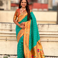 Sea Green Paithani Silk Saree with Gold Zari Border Floral Pallu
