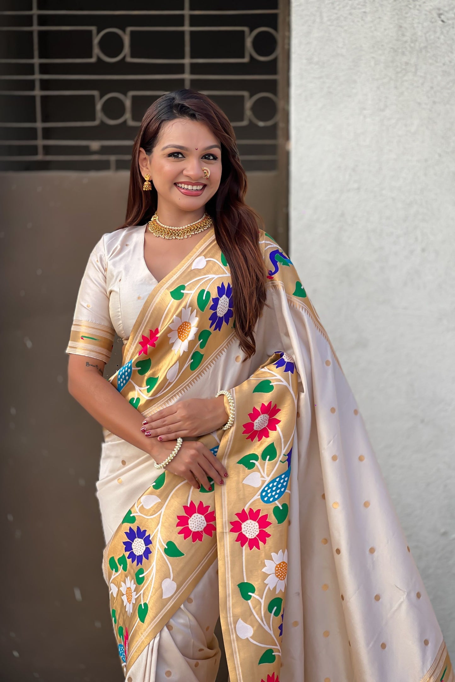 Cream Silk Saree with Multicolor Floral Peacock Motif Woven Border