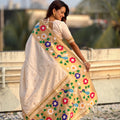 Cream Silk Saree with Multicolor Floral Peacock Motif Woven Border