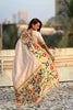 Cream Silk Saree with Multicolor Floral Peacock Motif Woven Border