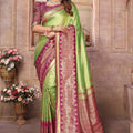 Green Kanchipuram Silk Saree with Pink Zari Woven Pallu