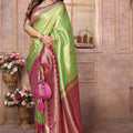 Green Kanchipuram Silk Saree with Pink Zari Woven Pallu