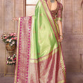 Green Kanchipuram Silk Saree with Pink Zari Woven Pallu