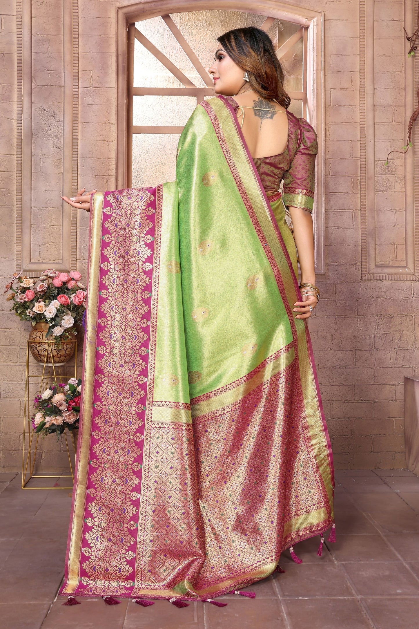 Green Kanchipuram Silk Saree with Pink Zari Woven Pallu
