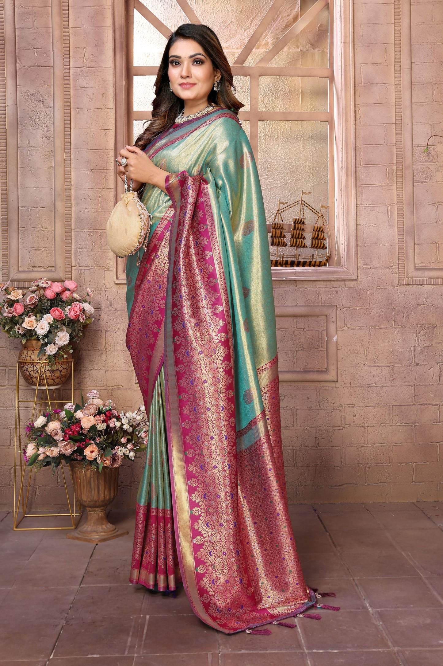Sea Green Kanchipuram Silk Saree with Pink Zari Woven Pallu