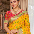 Mustard Yellow Silk Saree with Traditional Patola Contrast Red Pallu