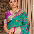 Green Patola Silk Saree with Pink Contrast Pallu Woven Designer Saree